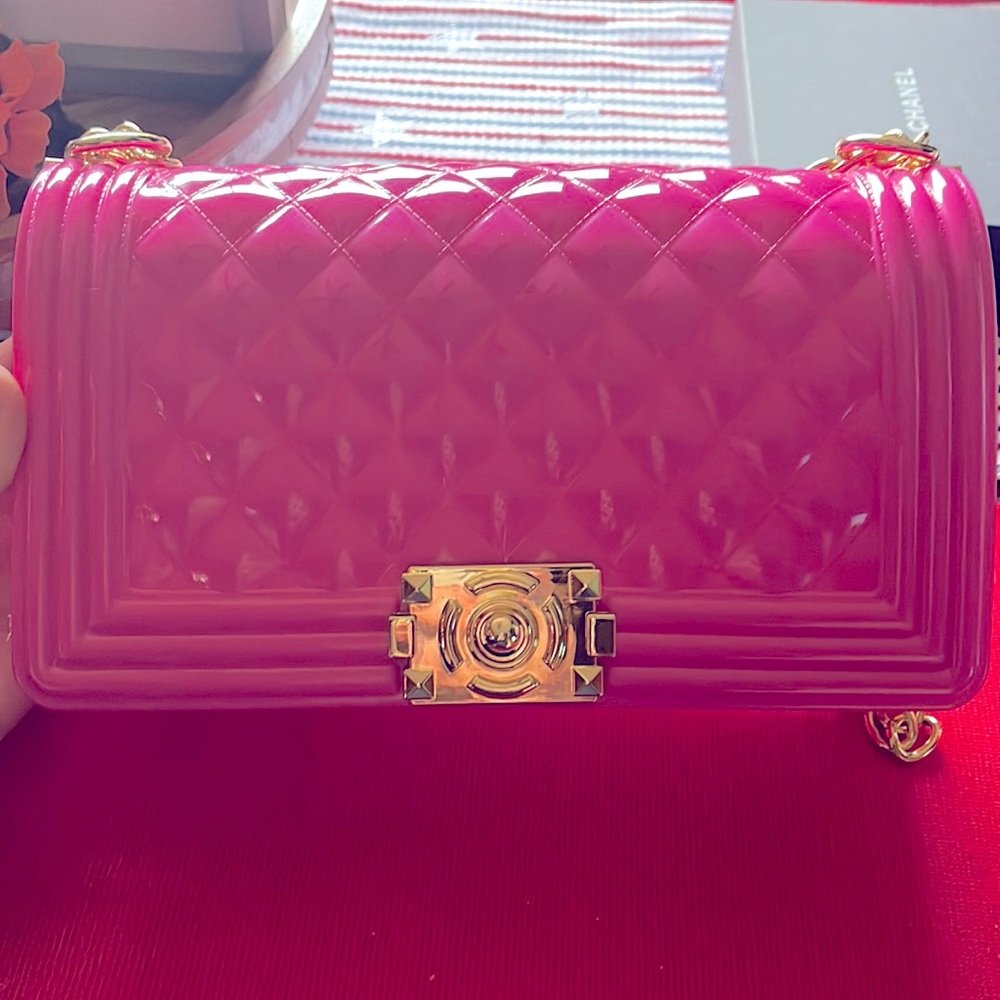 Hot pink jelly clutch bag